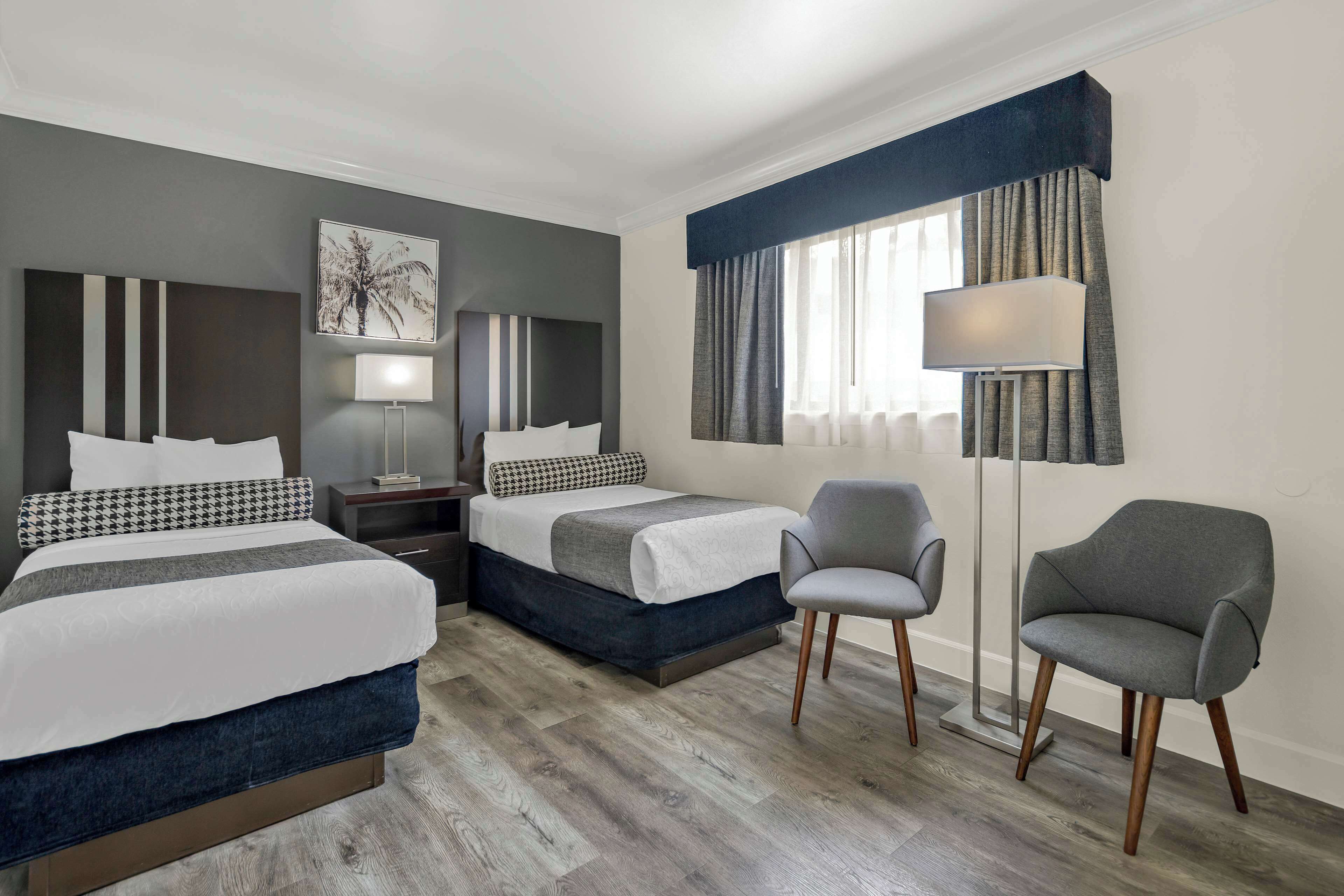 Pillowtop beds, desk, laptop workspace, blackout drapes