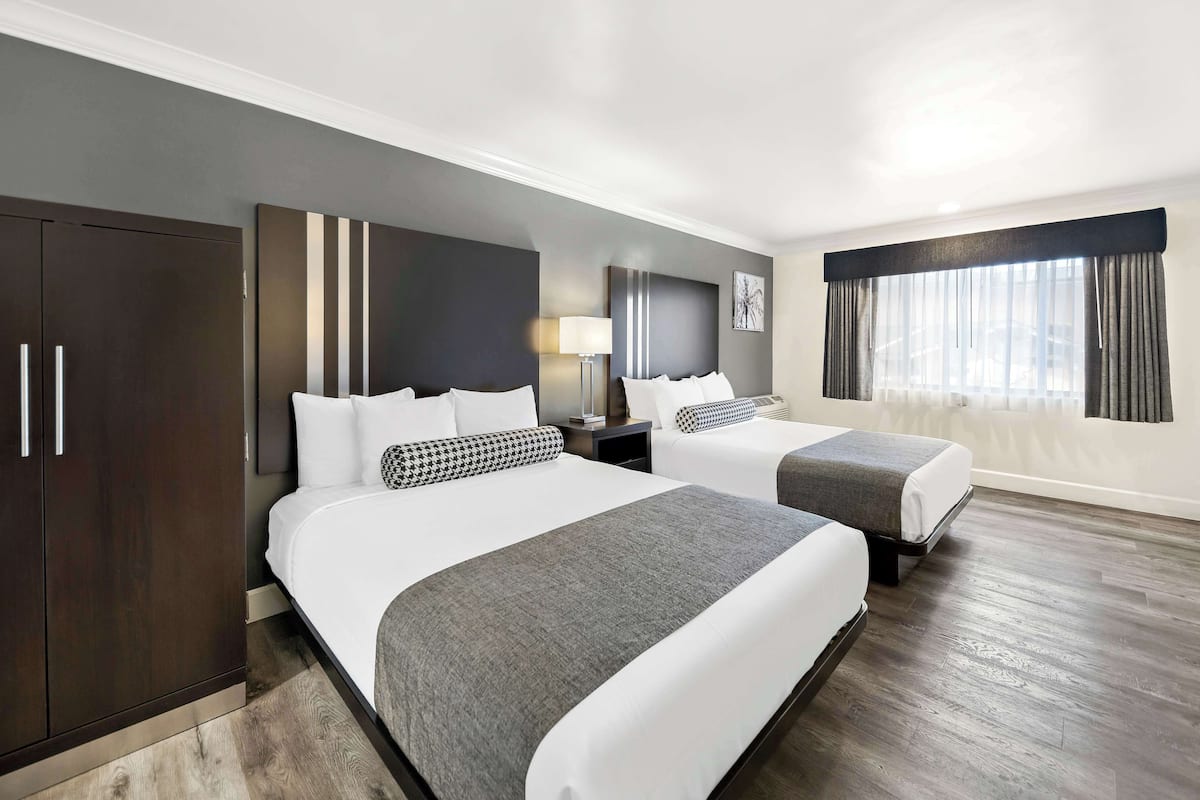 standard room, 2 queen beds, accessible, bathtub | pillow-top beds, individually decorated, individually furnished, desk