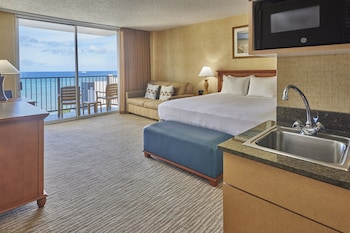 Deluxe Room, 1 King Bed with Sofa bed, Ocean View, Corner | In-room safe, desk, laptop workspace, blackout drapes at Waikiki Resort Hotel