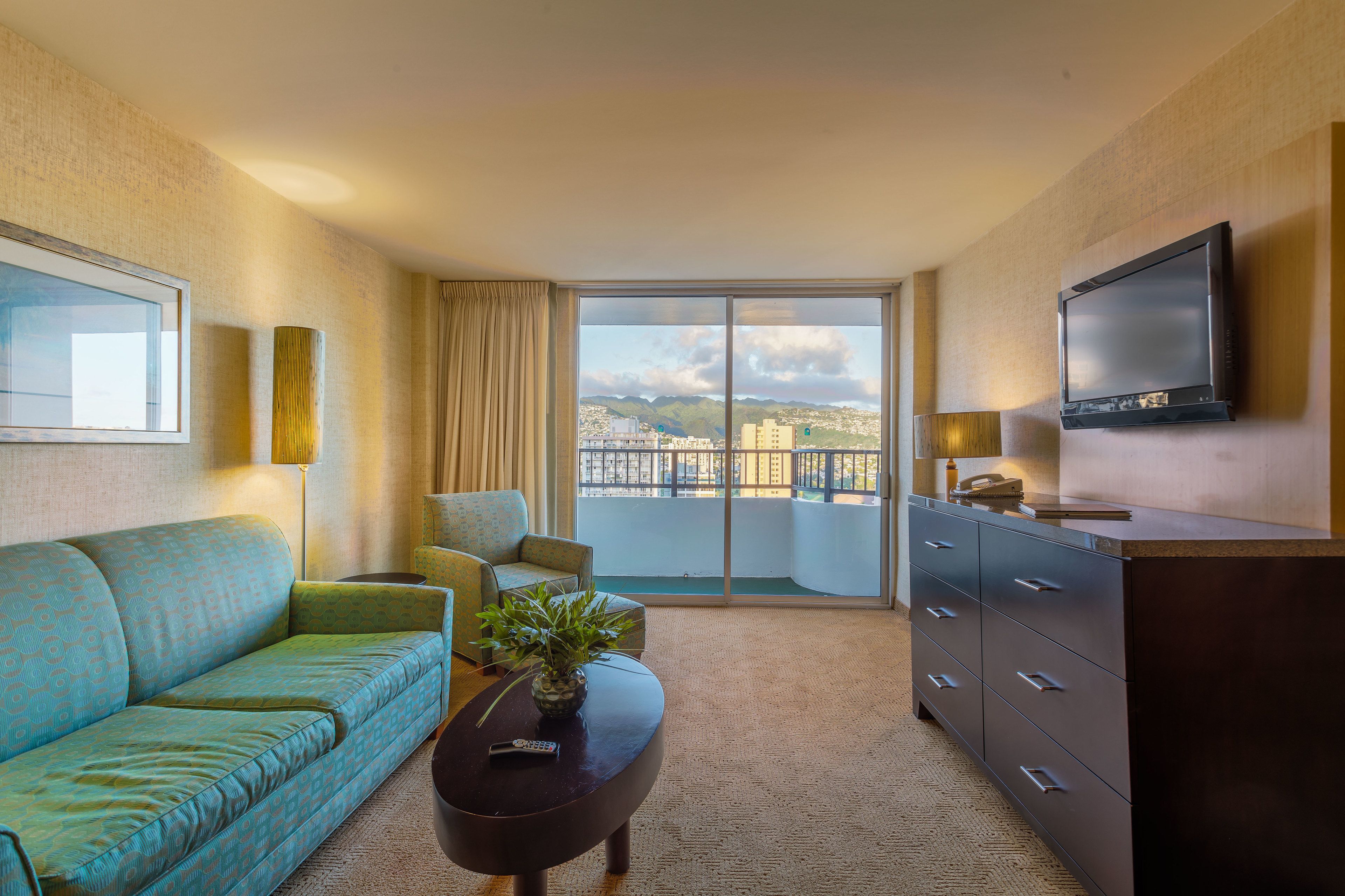 premium suite, 1 bedroom, mountain view | living room | 49-inch lcd tv with cable channels, tv, dvd player