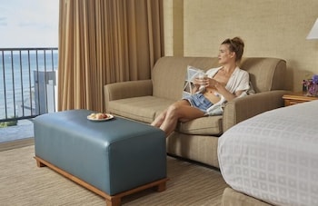 Deluxe Room, 1 King Bed with Sofa bed, Ocean View, Corner | In-room safe, desk, laptop workspace, blackout drapes at Waikiki Resort Hotel