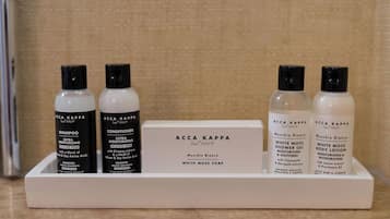 A set of ACCA KAPPA products including shampoo, conditioner, and body lotion.