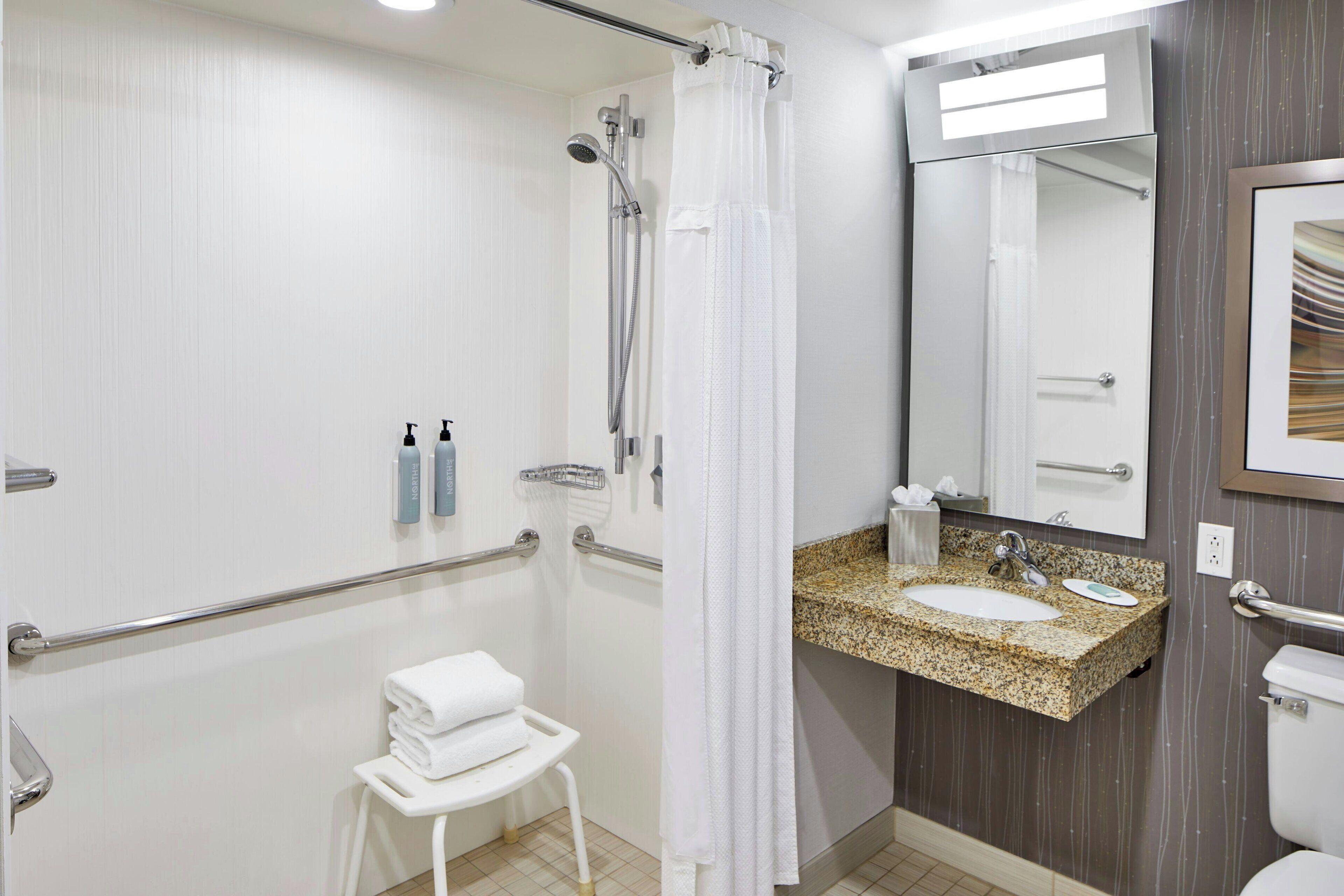 combined shower/bathtub, free toiletries, hair dryer, towels