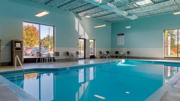 Indoor pool, open 9:00 AM to 9:00 PM, pool loungers