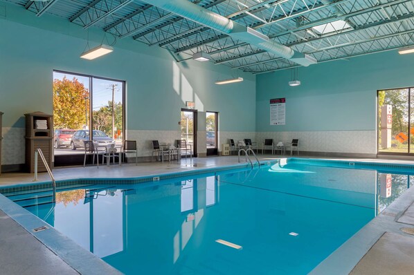 Indoor pool, open 9:00 AM to 9:00 PM, pool loungers
