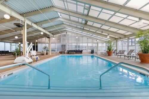 Indoor pool, open 6:30 AM to 10:00 PM, pool loungers