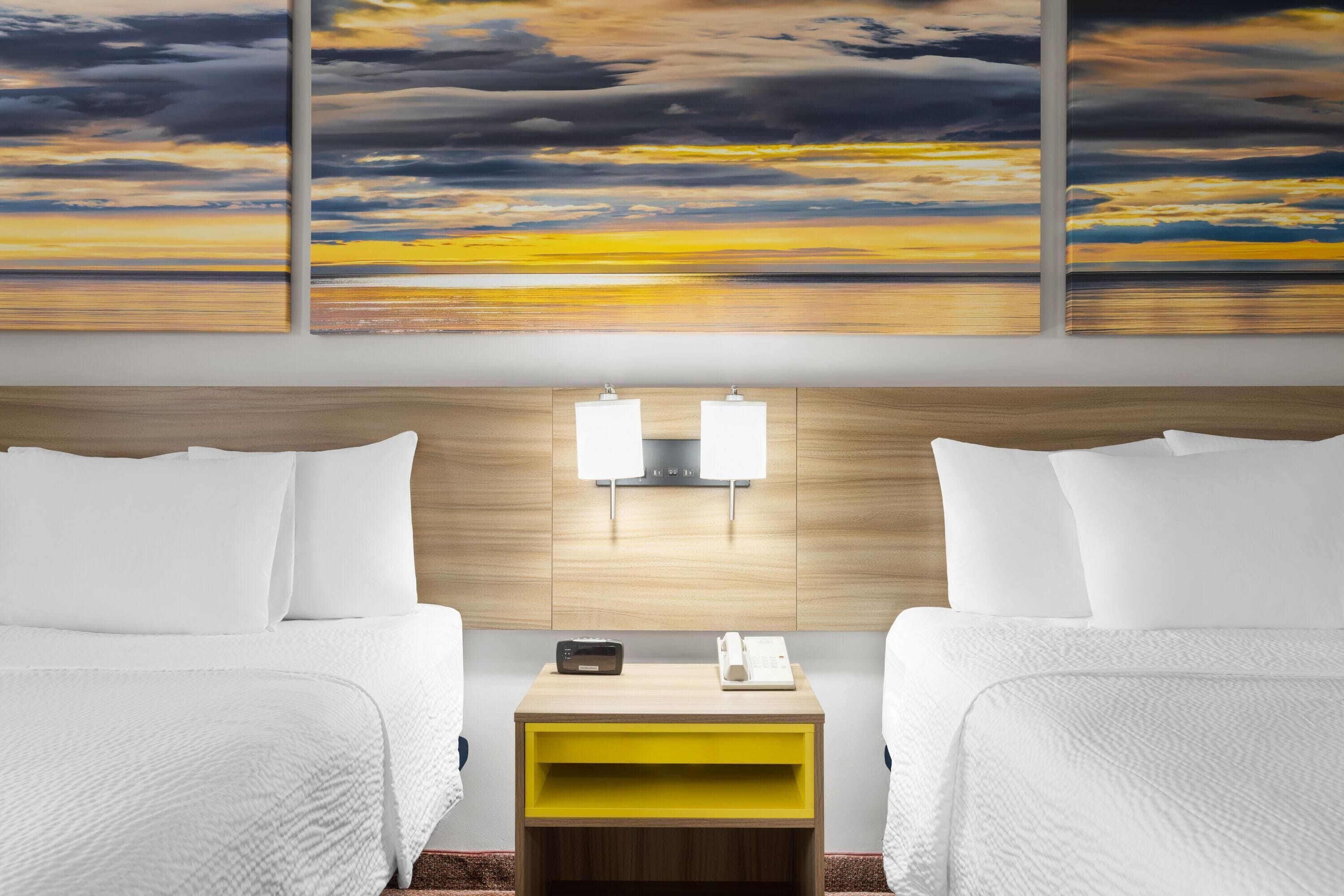 Desk, blackout drapes, iron/ironing board, free cribs/infant beds