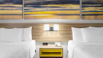 Desk, blackout drapes, iron/ironing board, free cribs/infant beds