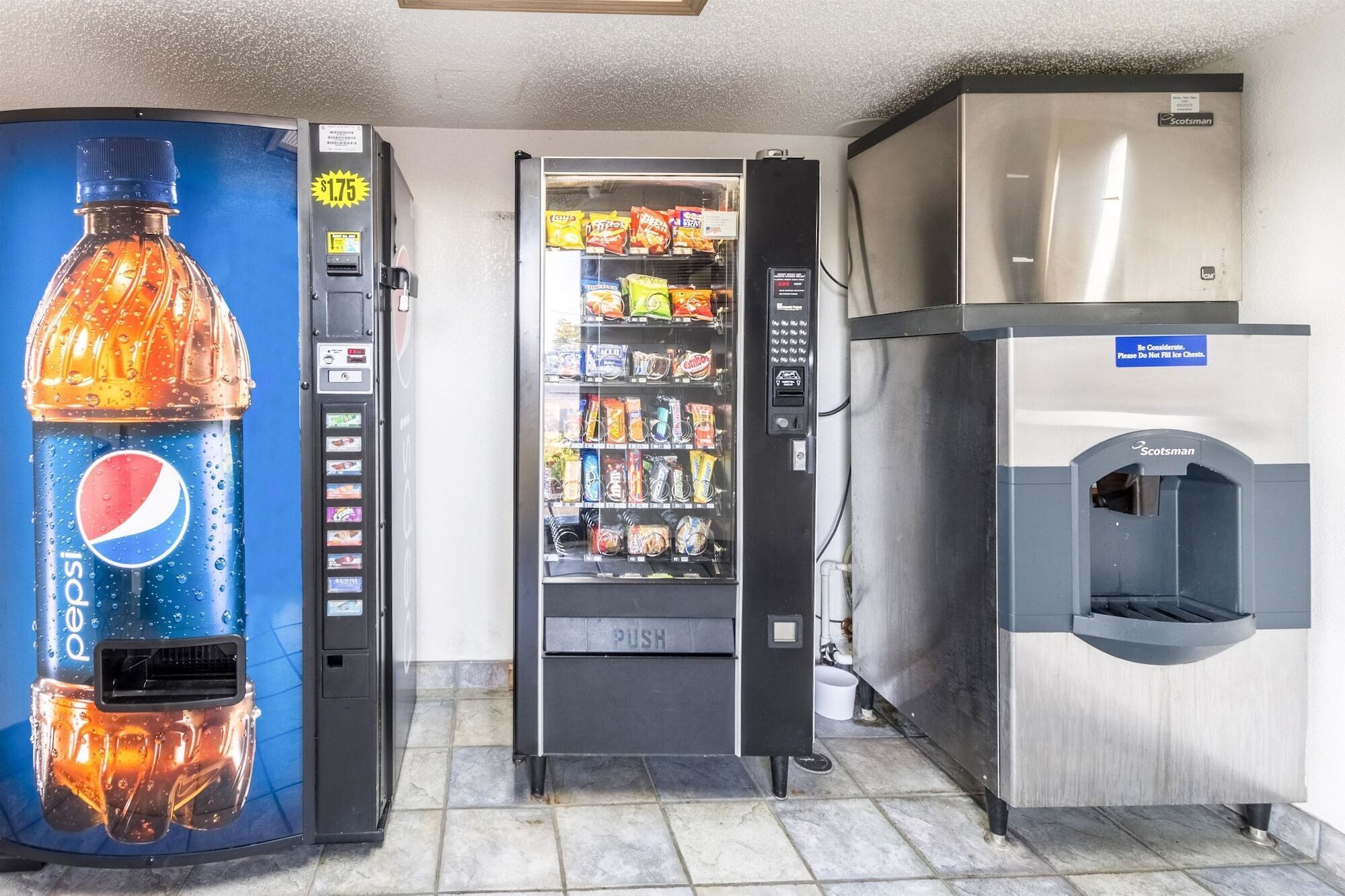 A vending machine with a Pepsi bottle, a snack vending machine, and a water dispenser.