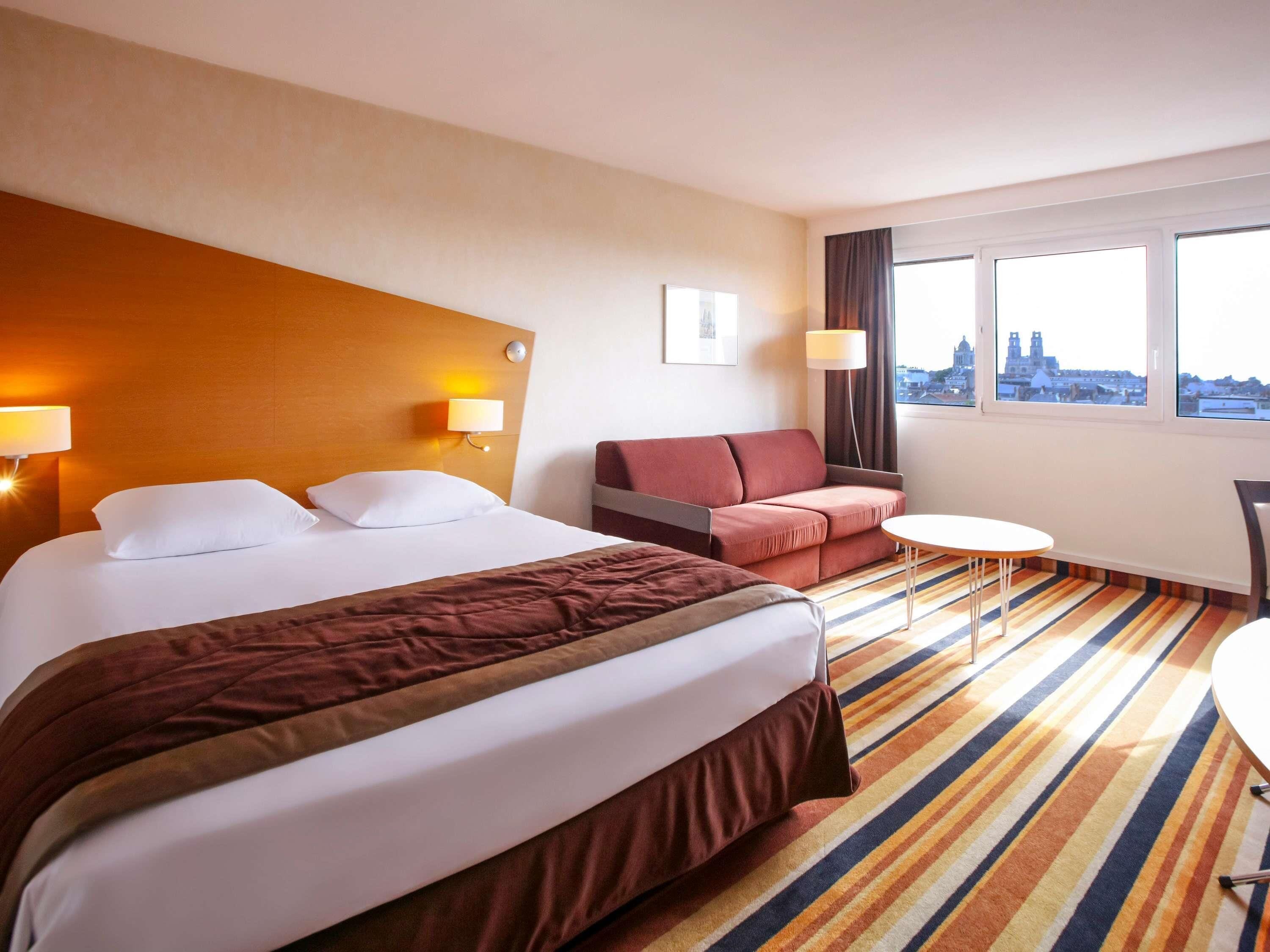Ropa de cama de alta calidad, colchones con pillow-top y minibar 