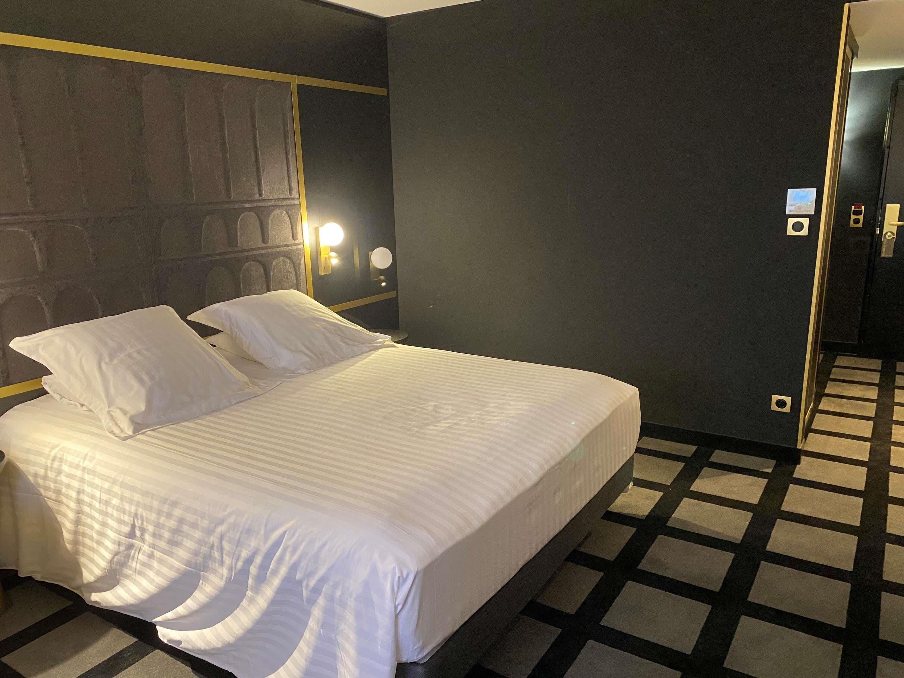 Premium bedding, pillow-top beds, minibar, in-room safe