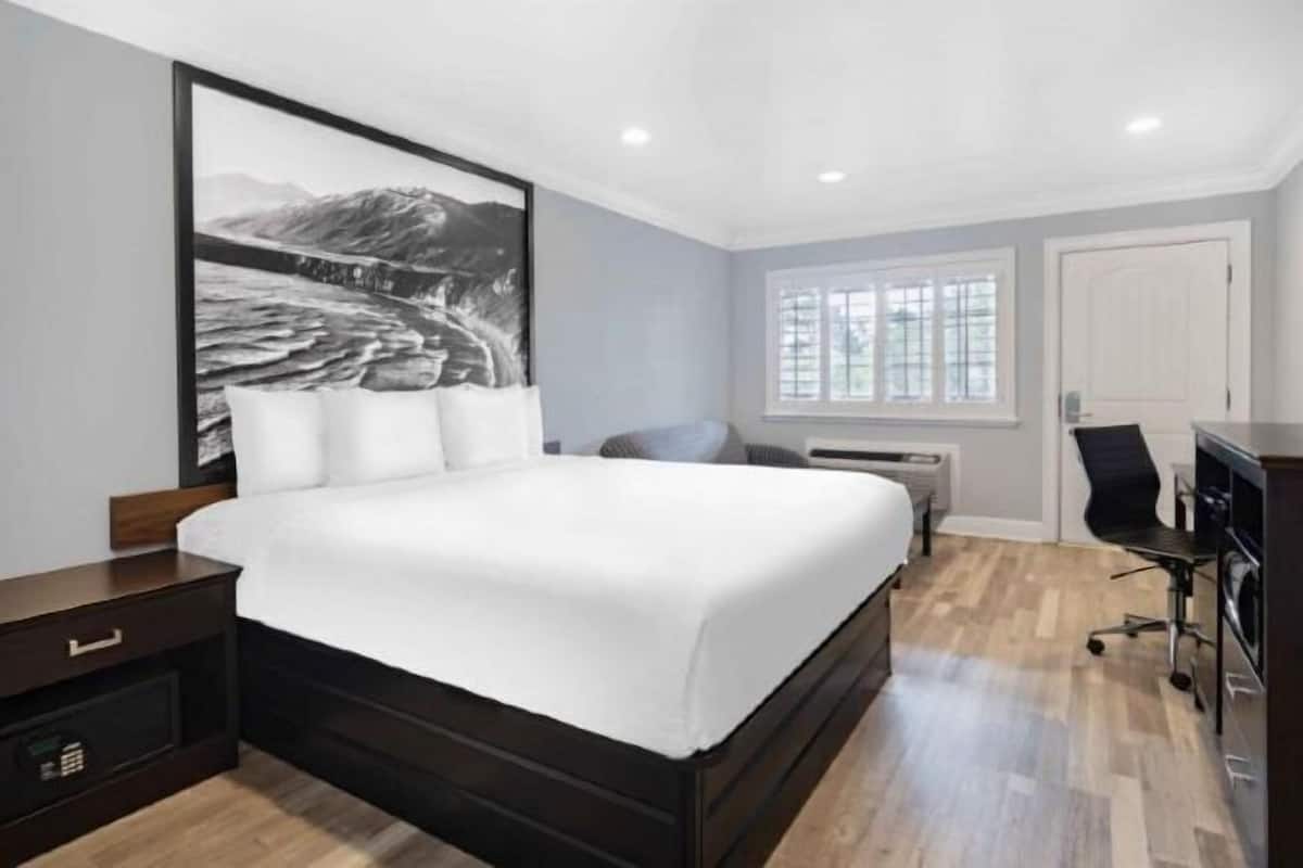 Premium bedding, down duvets, in-room safe, desk