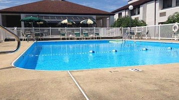 Seasonal outdoor pool, pool loungers