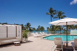 Outdoor pool, open 8:00 AM to 7:00 PM, free cabanas, pool umbrellas
