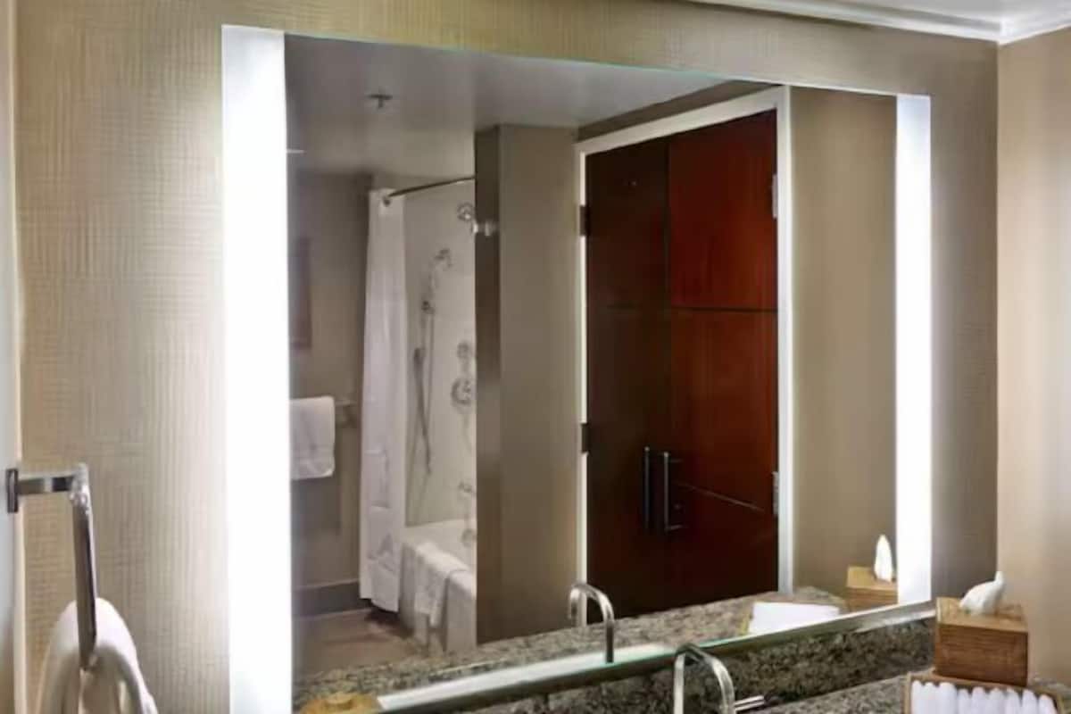 Designer toiletries, hair dryer, towels