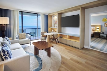 55-inch flat-screen TV with cable channels, TV, DVD player at Hilton Hawaiian Village Waikiki Beach Resort