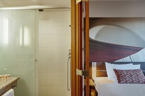 Shower, eco-friendly toiletries, hair dryer, towels
