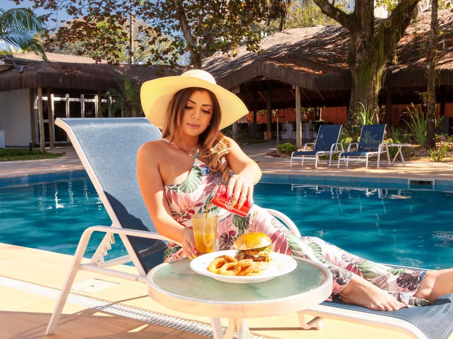 Outdoor pool, open 9:00 AM to 10:00 PM, pool umbrellas, pool loungers