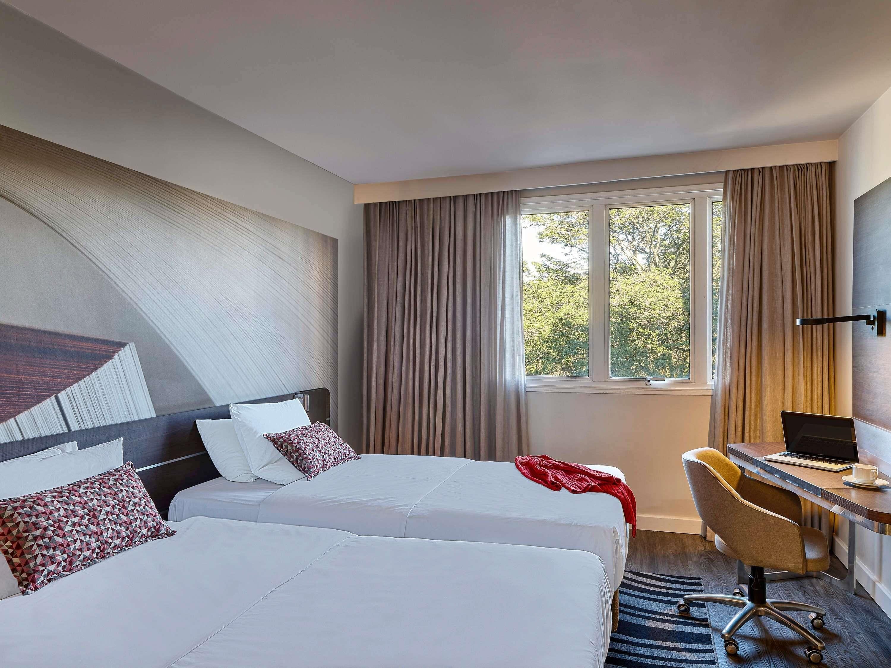 Superior Apartment, 2 Twin Beds | Minibar, in-room safe, desk, blackout drapes