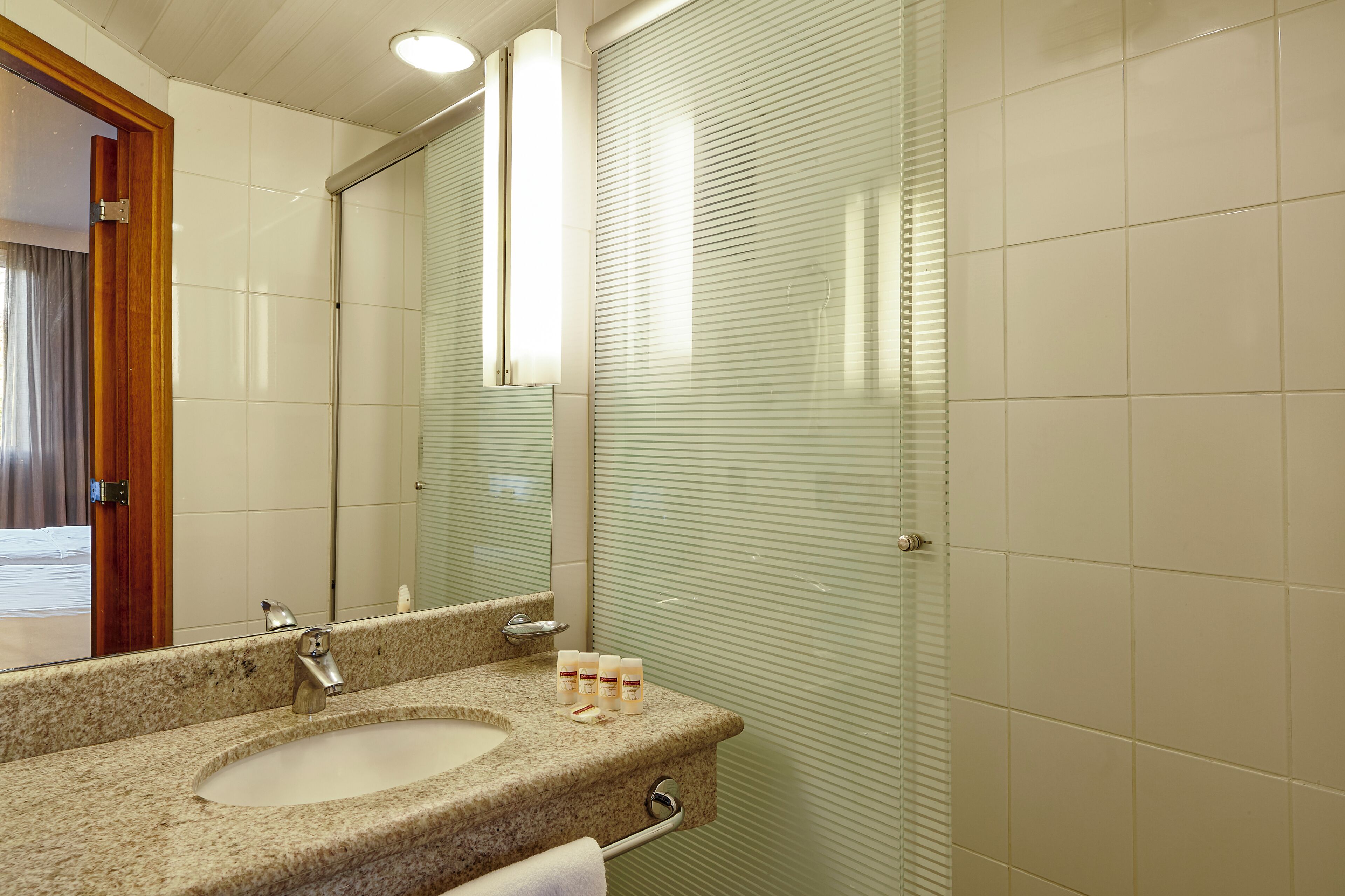 shower, eco-friendly toiletries, hair dryer, towels