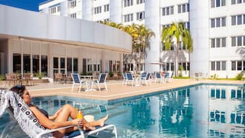 Outdoor pool, open 9:00 AM to 10:00 PM, pool umbrellas, sun loungers