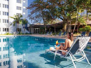 Outdoor pool, open 9:00 AM to 10:00 PM, pool umbrellas, sun loungers