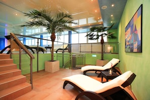 Indoor pool, open 7:00 AM to 10:00 PM, sun loungers