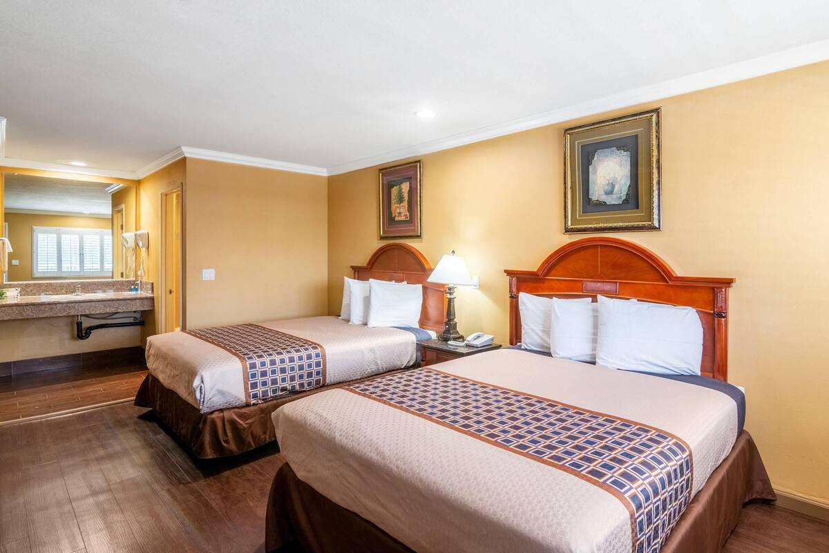 Standard Room, 2 Queen Beds, Non Smoking | Pillowtop beds, desk, soundproofing, iron/ironing board (on request)