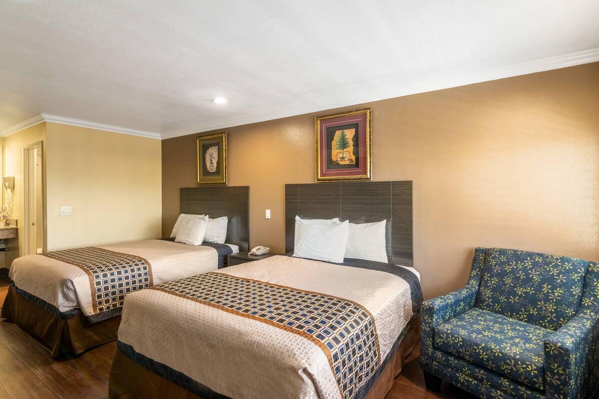 Deluxe Room, 2 Queen Beds, Non Smoking | Pillowtop beds, desk, soundproofing, iron/ironing board (on request)