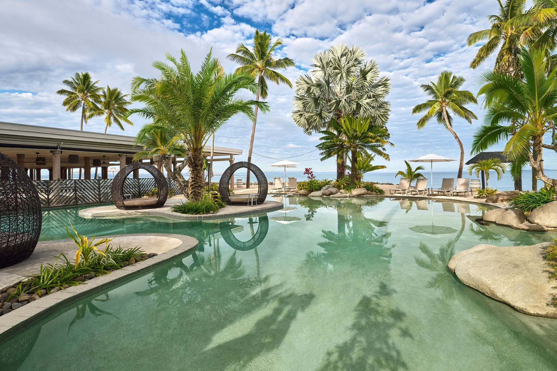 2 outdoor pools, open 7:00 AM to 7:00 PM, pool cabanas (surcharge)