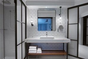 Designer toiletries, hair dryer, bathrobes, slippers