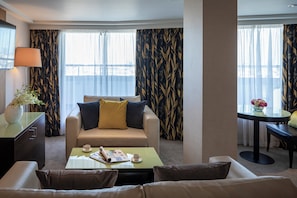 Penthouse (King Suite) | Living area | 32-inch LCD TV with satellite channels, TV
