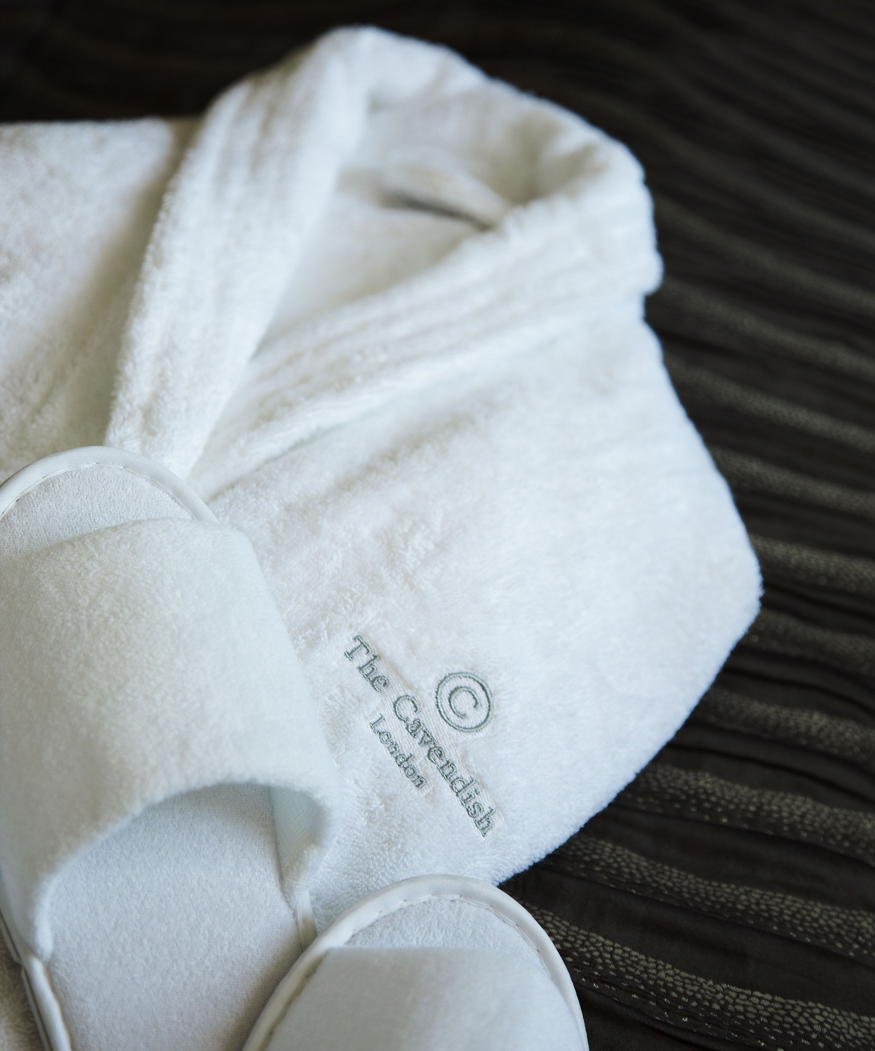 shower, designer toiletries, hair dryer, towels