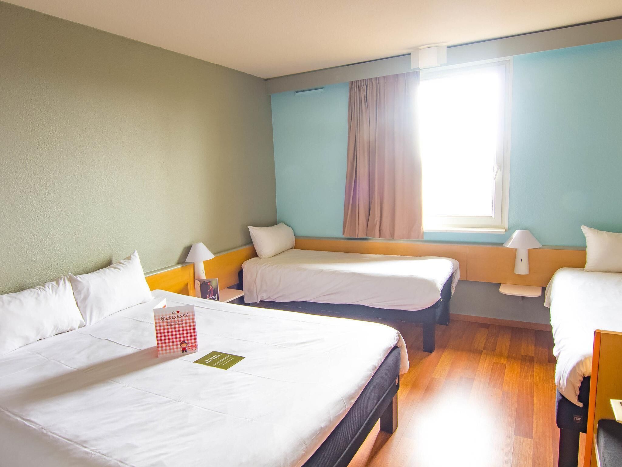 Standard Room, Multiple Beds | Premium bedding, desk, blackout drapes, iron/ironing board