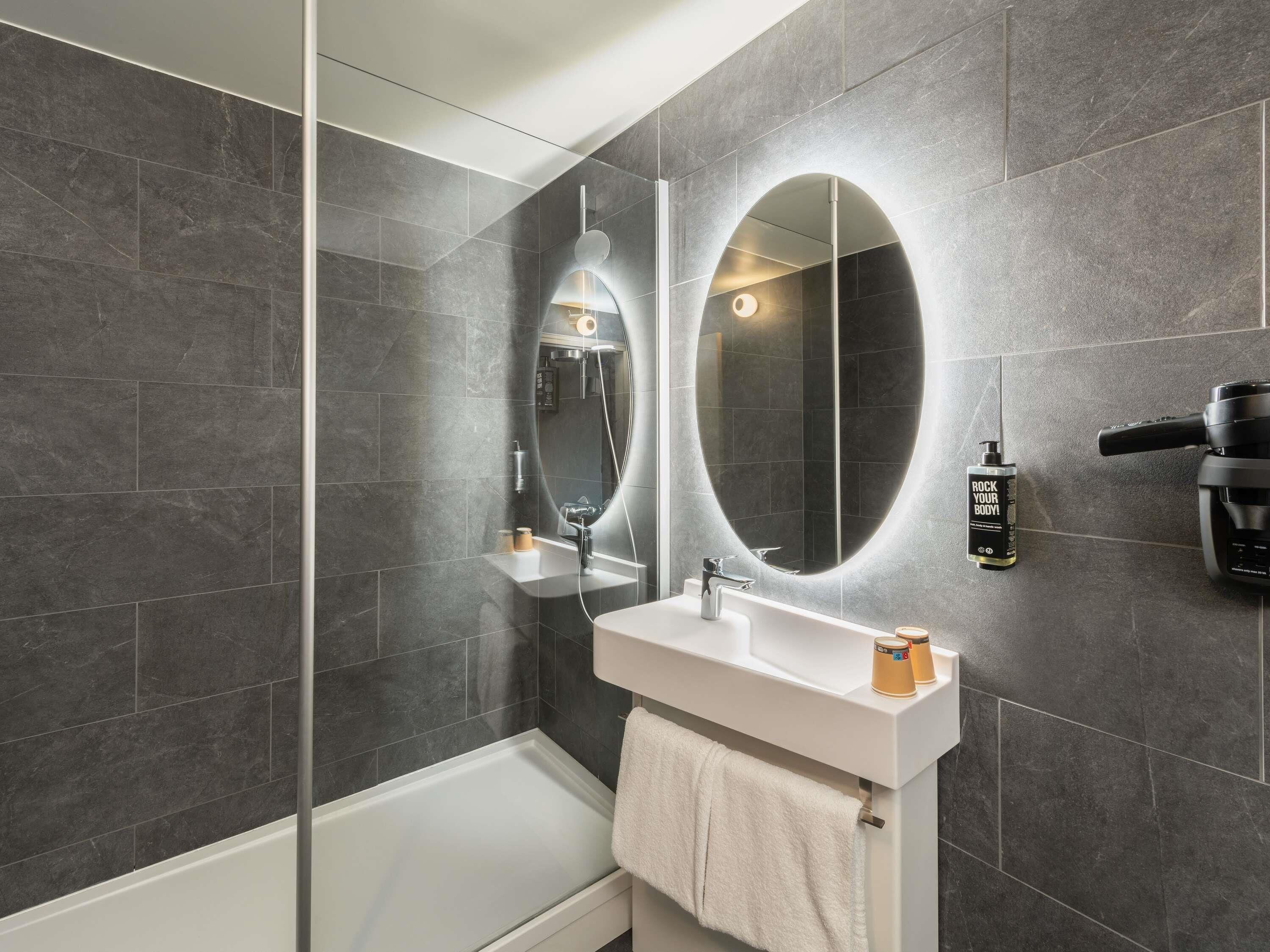 standard room, multiple beds | bathroom | shower, eco-friendly toiletries, hair dryer, towels