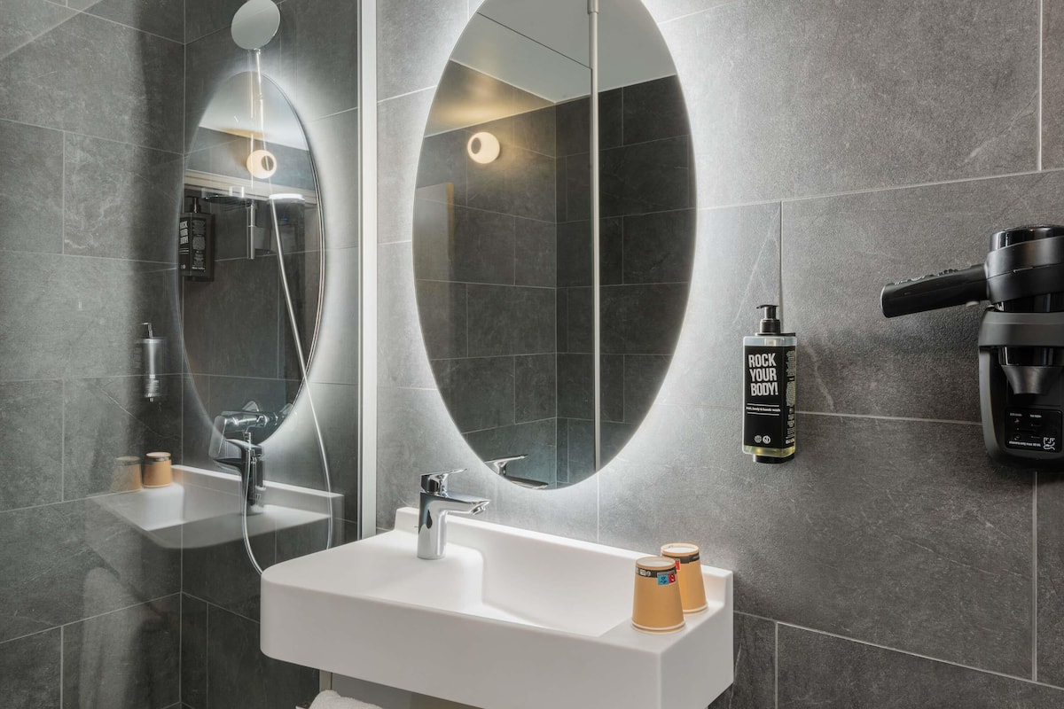 standard room, multiple beds | bathroom | shower, eco-friendly toiletries, hair dryer, towels