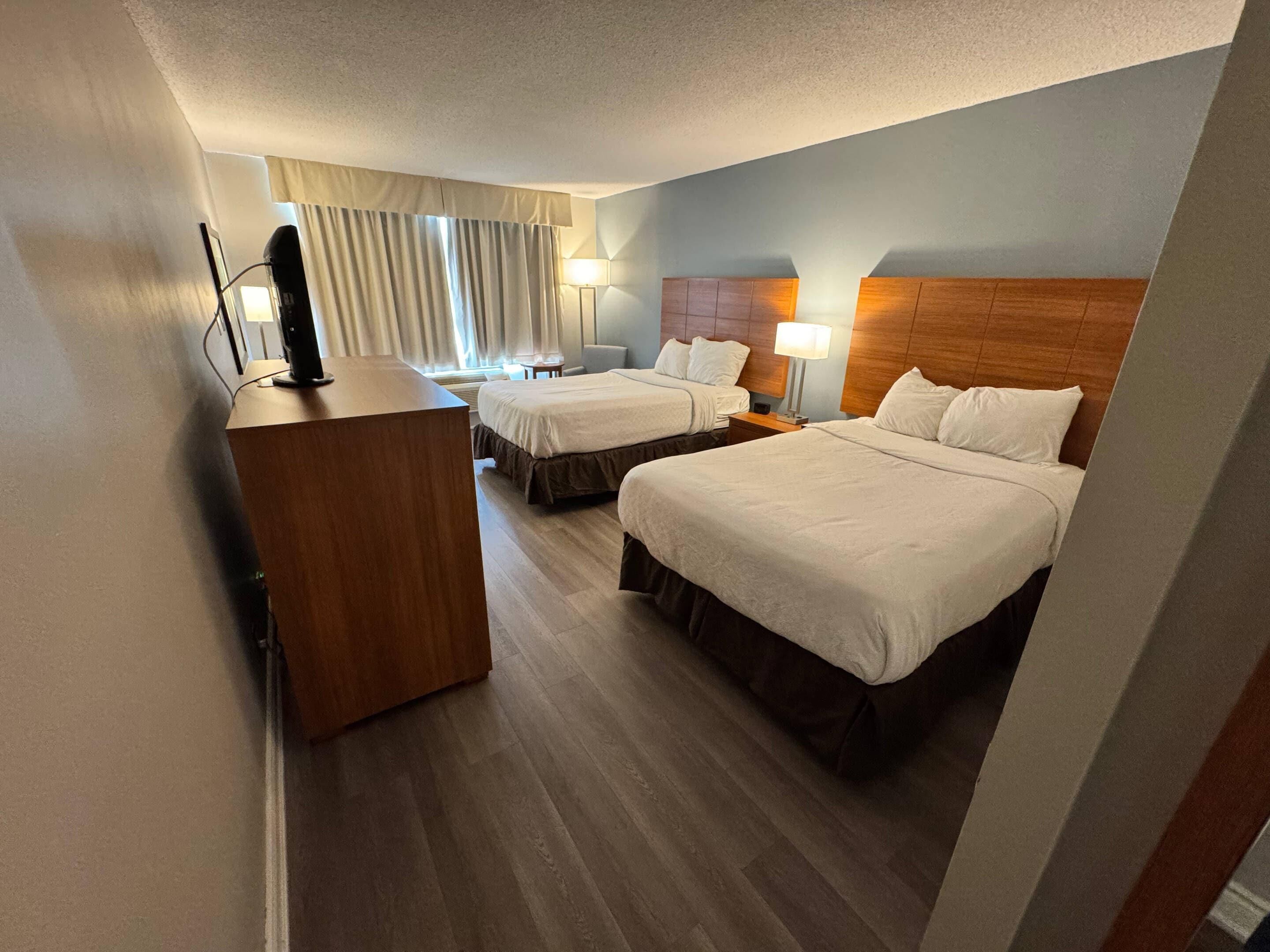 Standard Room, 2 Double Beds, Non Smoking | In-room safe, desk, iron/ironing board, free cots/infant beds