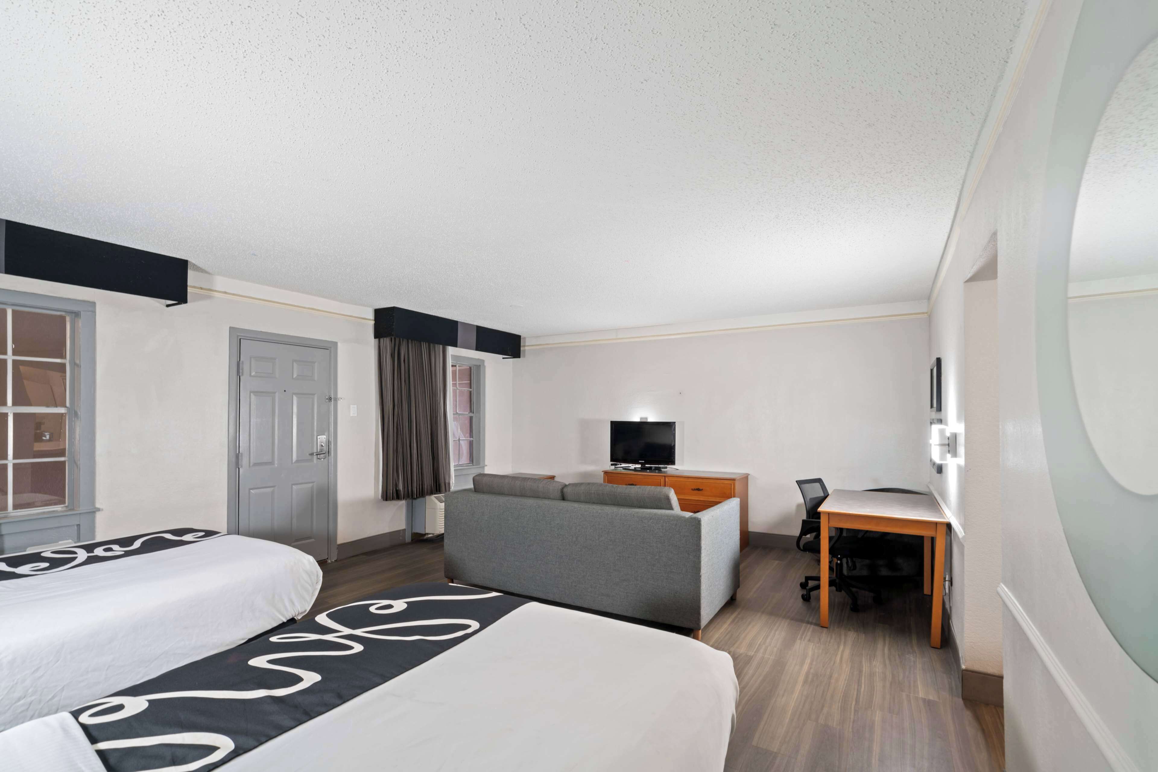 pillow-top beds, desk, blackout curtains, iron/ironing board