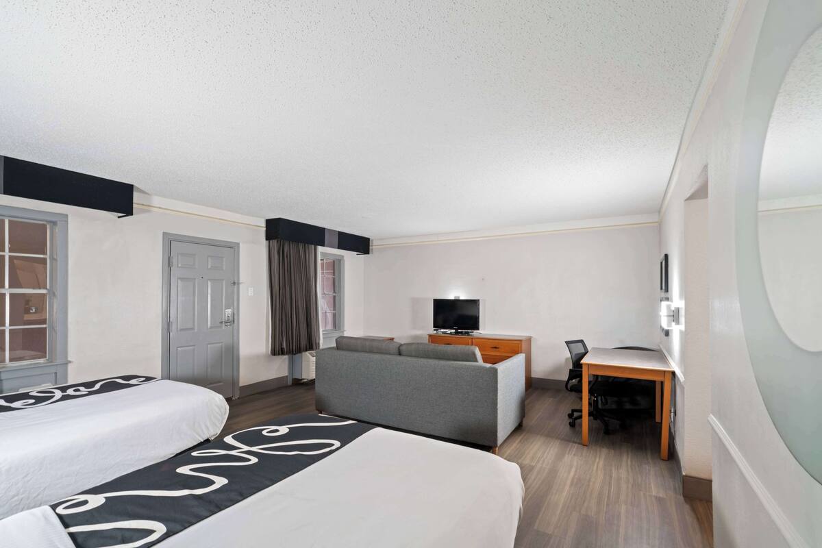 pillow-top beds, desk, blackout curtains, iron/ironing board