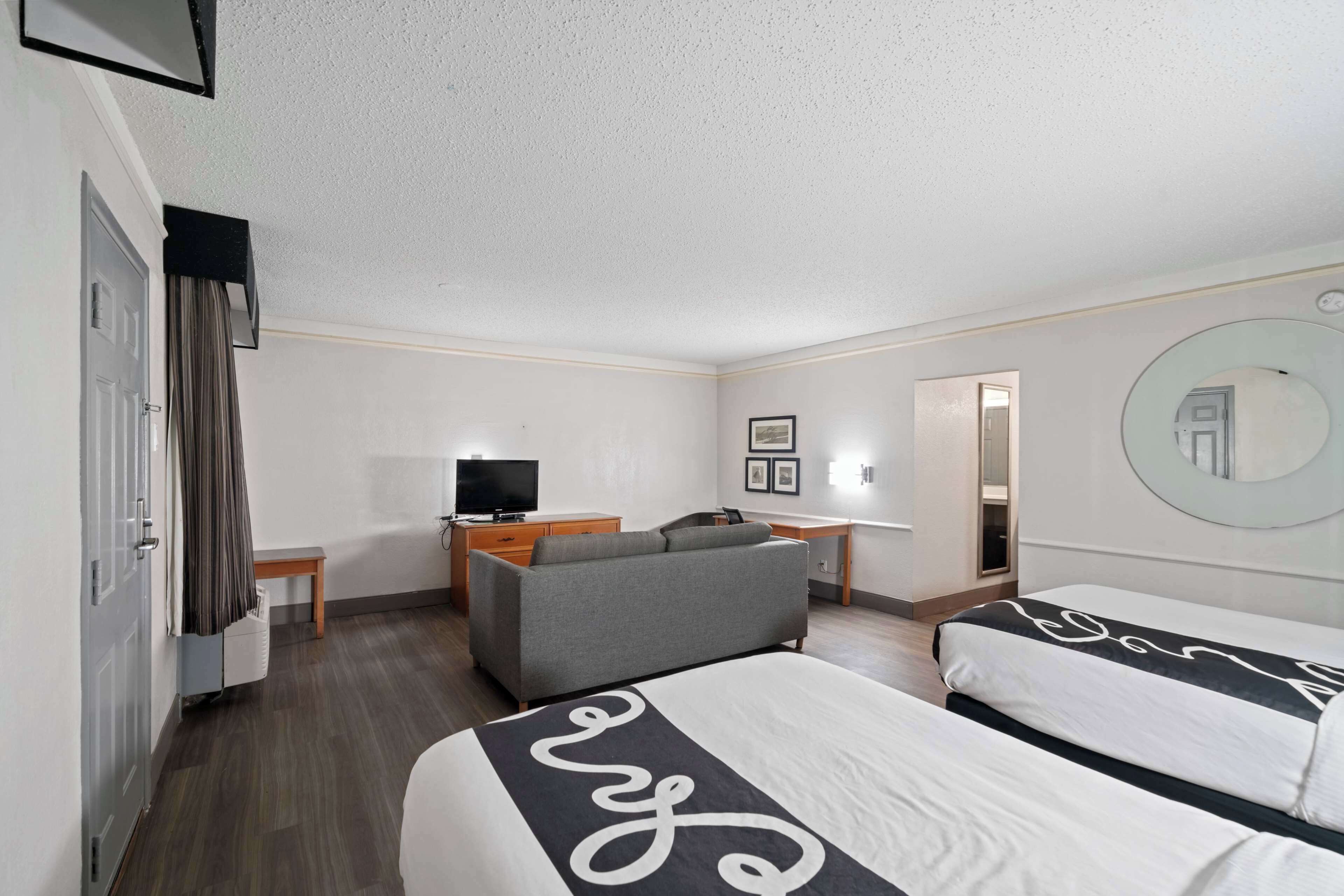 pillow-top beds, desk, blackout curtains, iron/ironing board