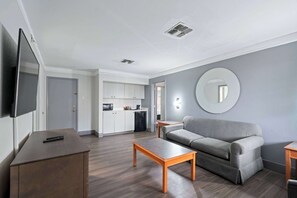 Pillow-top beds, desk, blackout curtains, iron/ironing board