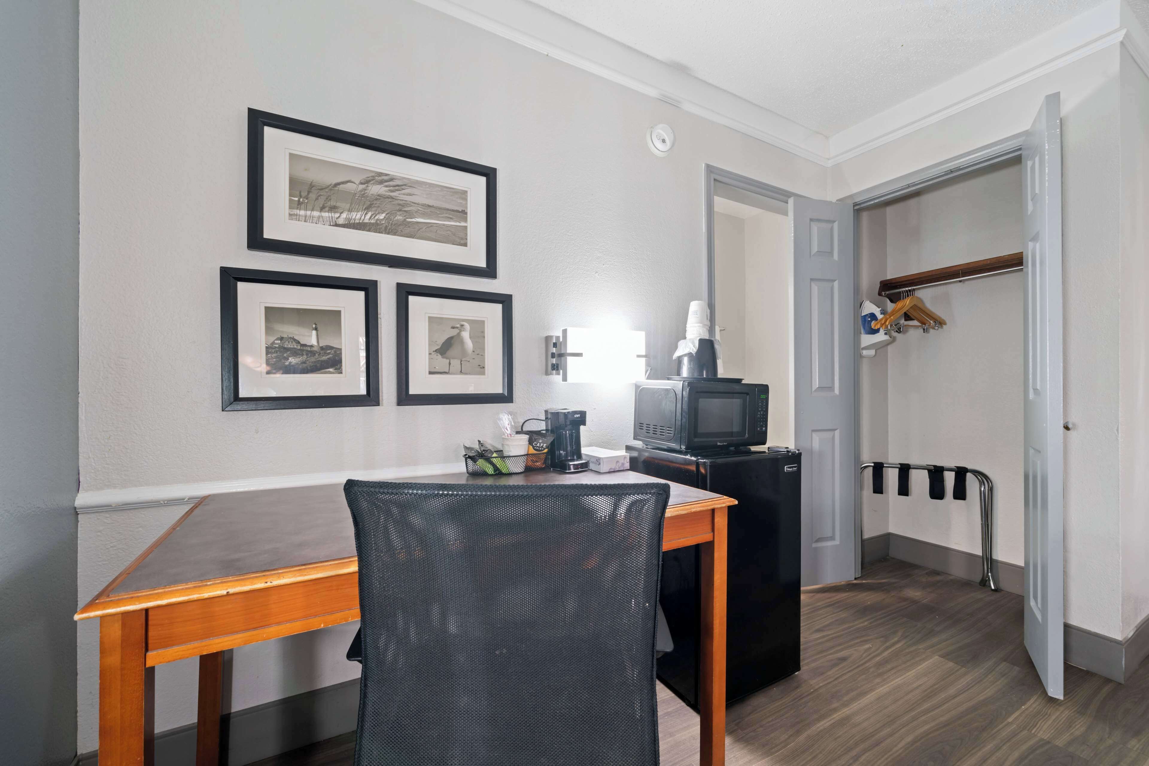 pillow-top beds, desk, blackout curtains, iron/ironing board