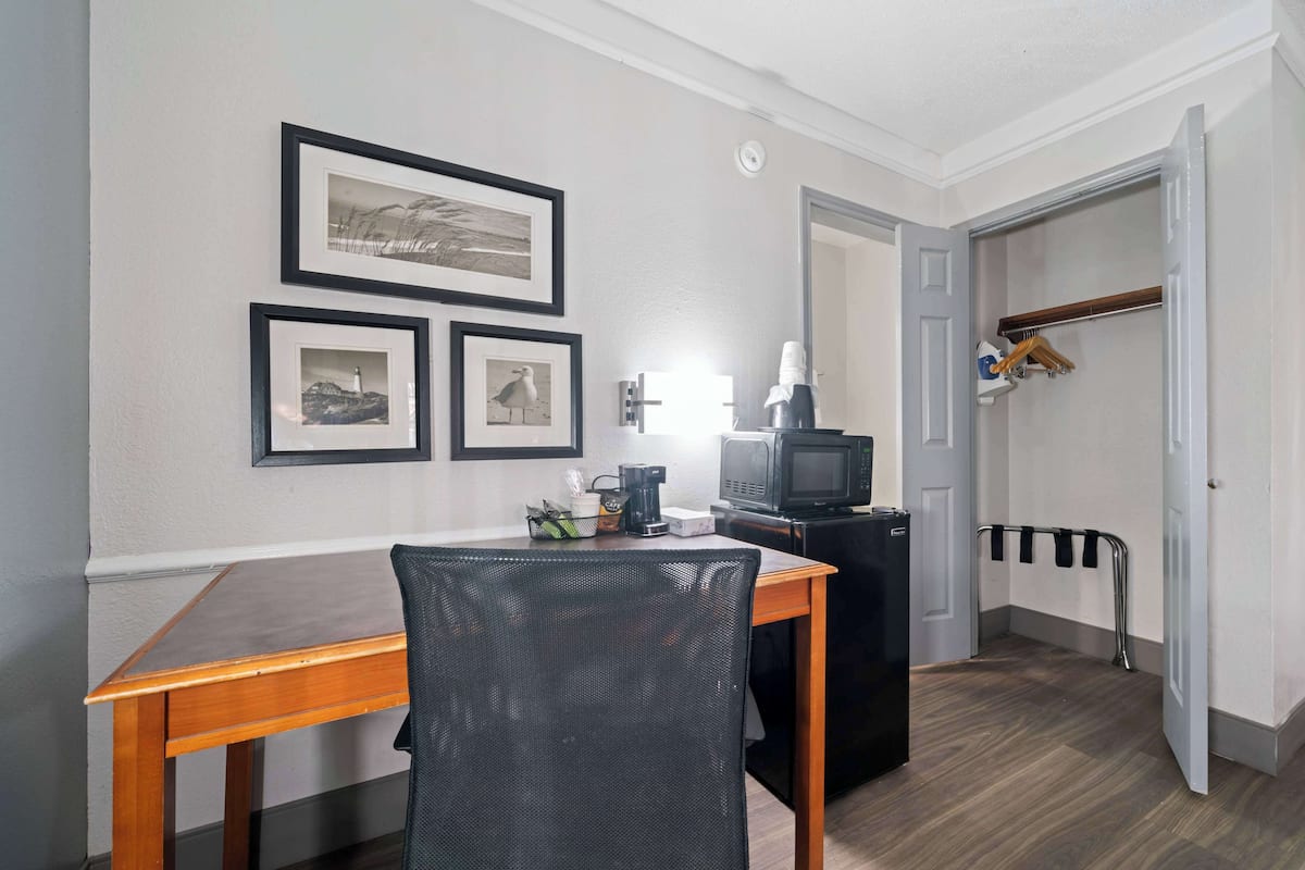 pillow-top beds, desk, blackout curtains, iron/ironing board