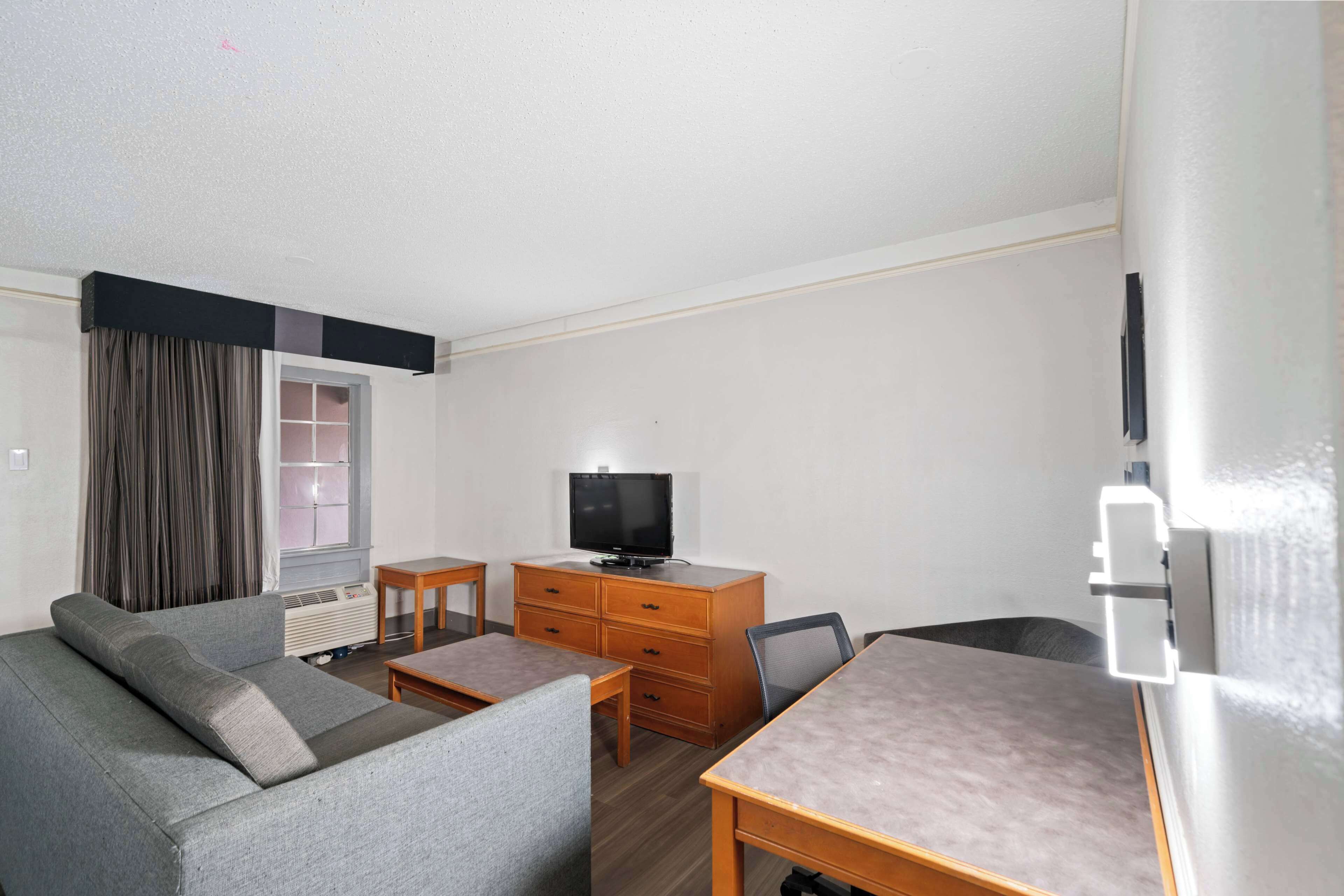 pillow-top beds, desk, blackout curtains, iron/ironing board