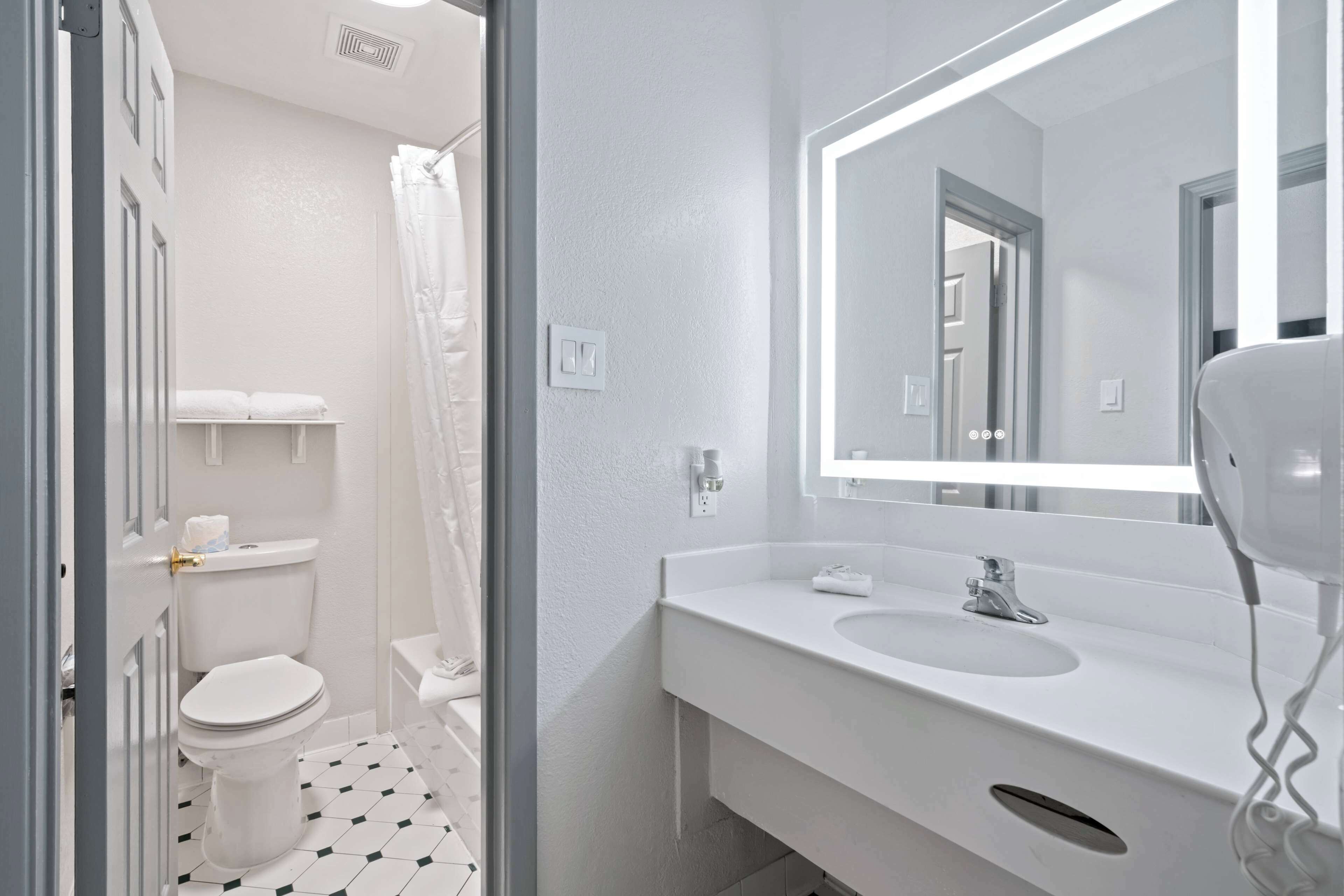 combined shower/bathtub, free toiletries, hair dryer, towels