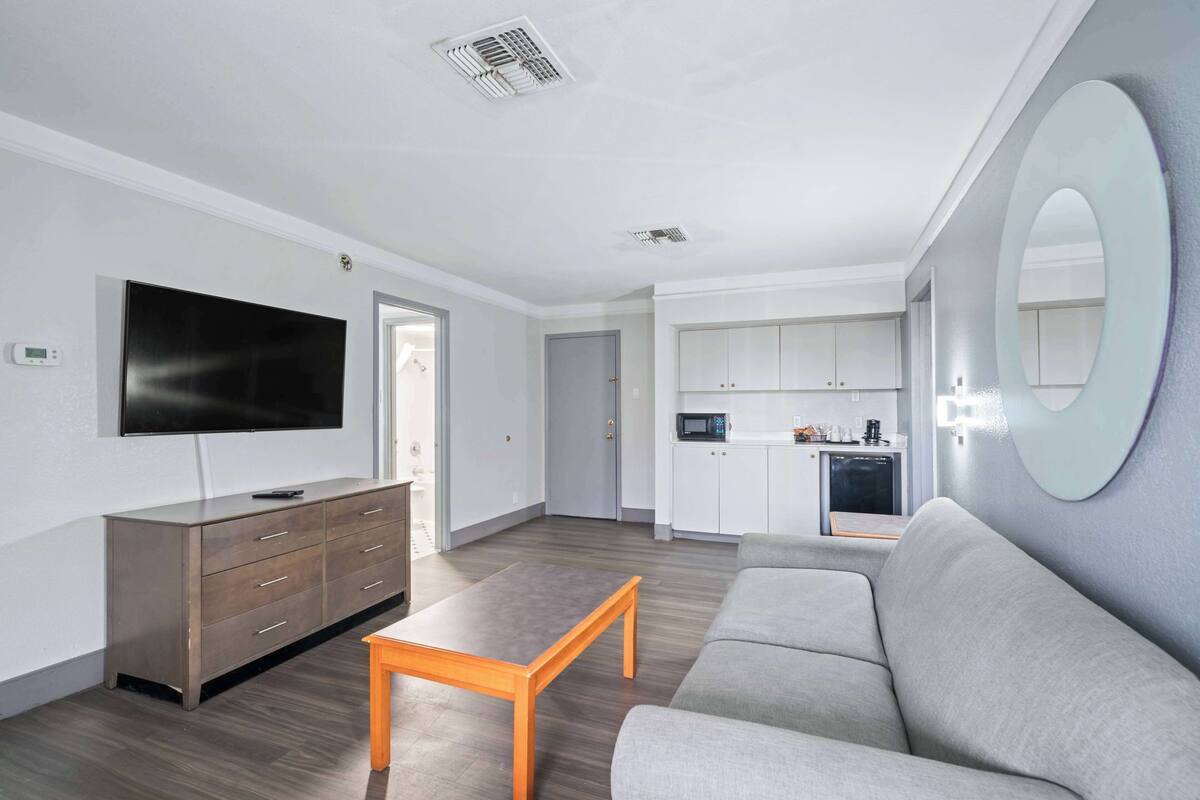 pillow-top beds, desk, blackout curtains, iron/ironing board