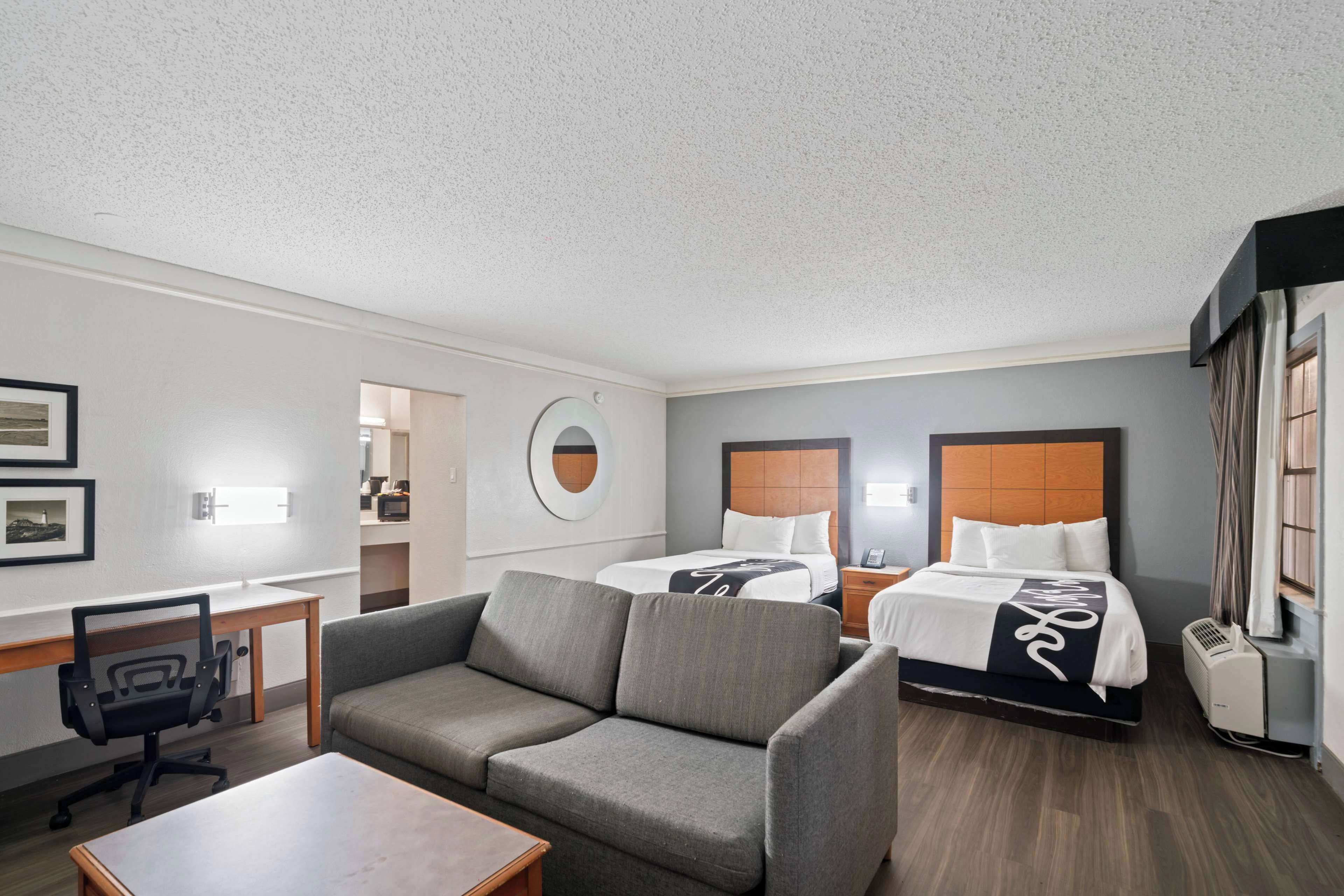 Pillow-top beds, desk, blackout curtains, iron/ironing board