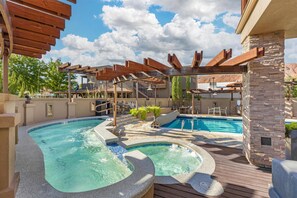 Seasonal outdoor pool, open 9:00 AM to 10:00 PM, pool umbrellas