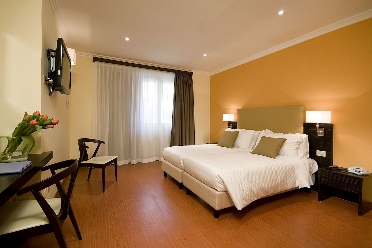 Premium bedding, minibar, in-room safe, desk