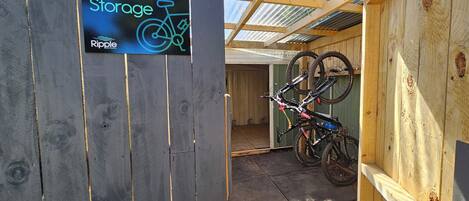 A bike storage area with a sign indicating it's for Ripple Rotaria.
